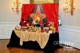 Our hollywood themed party decorations are accented with images of walk of fame stars, hollywood signs, and more! Movie Theme Table Decorations What S A Red Carpet Party Without Some Red Carpet Ropes A Red Carpet Party Hollywood Birthday Parties Red Carpet Party Birthday