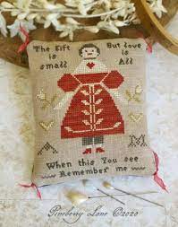 A list of cross stitch patterns available at everything cross stitch. Pineberry Lane The Gift Is Small E Pattern