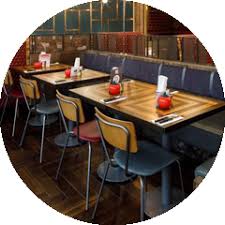 This atmosphere can be heightened by including warm wooden materials and more rustic dining tables, such as solid oak wood table tops or driftwood style dining tables to enhance the cosy dining room atmosphere. Commercial Dining Tables Industrial Dining Tables Uhs International