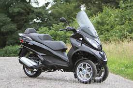 The company reserves the right to make technical and aesthetic modifications at any time. 2017 Piaggio Mp3 300 Business Road Test