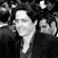 Hugh Grant: 90s Heartthrob Hair Loosely Swept Back Hairstyle