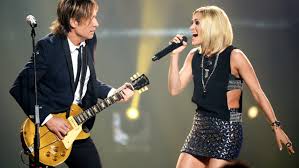 how keith urban and carrie underwoods fighter came