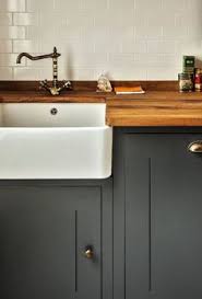 Don't forget to add essential outdoor items like rugs, beach towels and baskets to your patio, deck or poolside space. 25 Dark Grey Kitchen Ideas Dark Grey Kitchen Grey Kitchen Grey Kitchen Cabinets