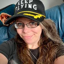 Horse loose black with white markings had a red head collar