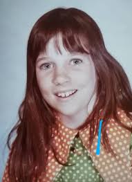 It is May of 1978 and picture day for my first grade class. I get to stand 