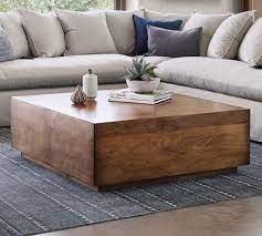 Finished in white milk paint and light distressing this coffee table with its chunky turn legs is made of reclaimed fir barn wood. Parkview 36 Reclaimed Wood Coffee Table Pottery Barn