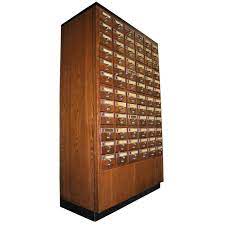 Well you're in luck, because here they come. Vintage Library 72 Drawer Card File Cabinet For Sale At 1stdibs