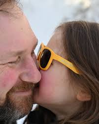 We are *fully* embracing the coziness of winter! ❄️ With the girls in their  favorite matching sweatshirts, we moved our craft table right in front of  the wood stove to make garlands