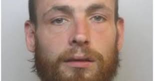 Live: Do not approach wanted man who has man and woman tattooed