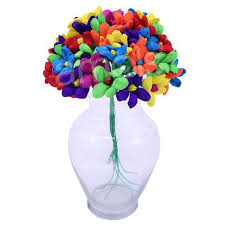 These vibrant ruffled flowers in purple, pink, turquoise, green, orange, red, and lavender are a mexican tradition. Mexican Paper Flowers Fiesta Party Supplies