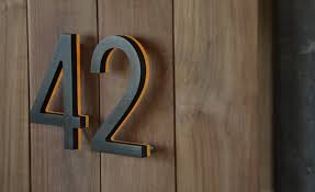 Custom house number plaque can be made from almost anything. Modern Bronze House Numbers Illuminated Luxello