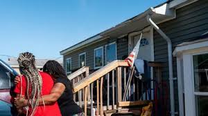What drove a woman and child to jump off a roof amid Louisiana shooting chaos?