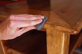 If you want to apply waterlox to your wood surface, you'll need to sand it down. Waterlox