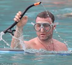 Liev Schreiber gives son Alexander some snorkelling tips as he and Naomi  Watts enjoy family holiday in St Barts