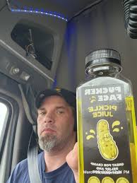 Ahhh, what could be better, eating a small, sweet French cornichon beside  an adventure story (that I happen to have written) about two French  children who must win a pickle contest! Did