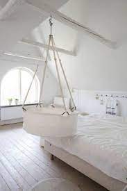 7 Tips On How To Style Your Leander Cradle To Look Like A Designer Nursery Baby Furniture Hanging Crib Hanging Bassinet