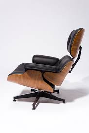 Your lounge chair and ottoman are made to order in the usa. Ch587 Black Eames Style Lounge Chair And Ottoman Prop Rental Acme Brooklyn