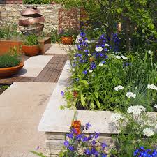 We added a full width extension with crittal doors to create an open plan kitchen/diner/play area for the family, and added a handsome devol shaker. 46 Small Garden Ideas Decor Design And Planting Tips For Tiny Outdoor Spaces