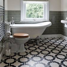 Since water is so prevalent in the bathroom, moisture can quickly ruin the wrong flooring. 10 Clever Ways To Renovate Your Bathroom On The Cheap White Vinyl Flooring Bathroom Vinyl Black And White Bathroom Floor