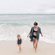 Mama And Toddler Daughter On The Beach In The Swim Suits Kids Fashion And Mom Style Ready For The Ocean Toddler Beach Toddler Bathing Suits Toddler Vacation