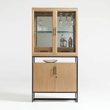 The bar cabinet ships flat to your door and requires assembly upon opening. Lemoine Locking Lighted Bar Set Reviews Crate And Barrel