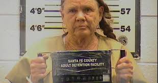 Santa Fe County woman charged with killing husband, wounding friend