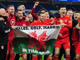 The images are of high quality. Gareth Bale Celebrates Wales Win With Wales Golf Madrid Flag