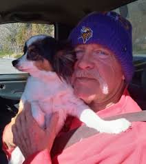 This is our 8 month old “Molly Bell”s 2nd time camping & she is already a  pro, she's helping Dad wash dishes. 🥰🐶🥰