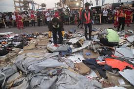 Indonesia finds body parts, debris, detects emergency signal of crashed jet. Officials Sift Through Scattered Body Parts Belongings To Identify Victims In Indonesia Plane Crash Se Asia News Top Stories The Straits Times