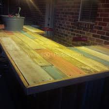 For sure, it will be cheaper to make own bar table than buying it in the store, and the whole process give you a lot of fun. Reclaimed Pallet Wood Bar 1001 Pallets In 2020 Wooden Pallet Bar Wood Bar Top Reclaimed Wood Bars