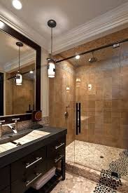 Pin By Carol On Shower Pebble Tile And Stone Tile Ideas Brown Tile Bathroom Pebble Tile Shower Mediterranean Bathroom Design Ideas