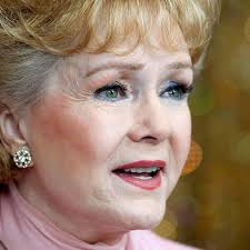 Actress Debbie Reynolds, known for 'Singin' in the Rain,' dies a day after  daughter Carrie Fisher