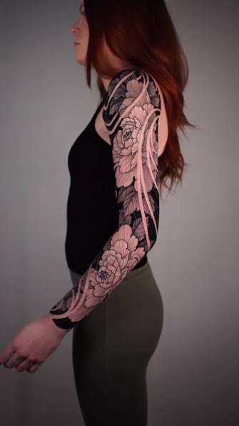 Negative Space Tattoo Sleeve Designs