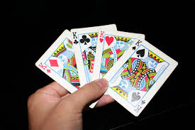 She notes that playing cards are much more black and white. King Playing Card Wikipedia