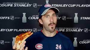 François legault wrote when posting his photo: Phillip Danault Takes Time To Eat Pizza During Post Match Press Briefing