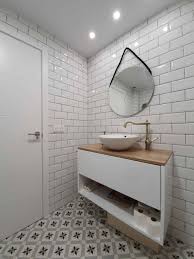 See how top designers create both timeless and trendy looks with marble, cement, ceramic, porcelain, faux wood and glass tile. Small Bathroom Flooring Ideas That Will Transform Your Space