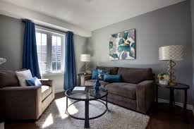 The decor is quite minimal, but thanks to the wall color the room feels warm and cozy. Color Ideas For Living Room Gray Wall Paint Interior Design Ideas Ofdesign