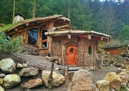 La Maison Du Hobbit In The French Alps Built With The Cordwood Technique Earthship Home House In The Woods Hobbit House