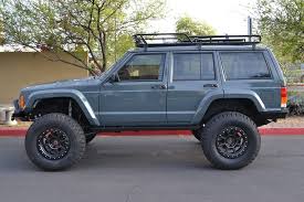 Great Looking Xj With Roof Rack And Flush Lights Jeep Cherokee Sport Jeep Xj Jeep Cherokee Xj