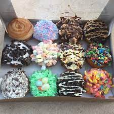 They have the cutest donuts and it's so cool because they dip them in all kinds of toppings for you. Peace Love And Little Donuts Irwin Restaurant Reviews Phone Number Photos Tripadvisor