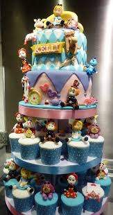 A little history of alice in wonderland. Alice In Wonderland Cupcake Tower Alice In Wonderland Cupcakes Cupcake Cakes Friends Cake