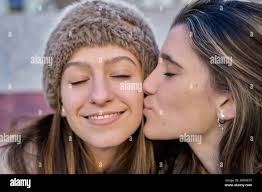College kiss hi-res stock photography and images