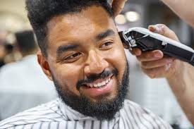 This fade haircut black men is an authentic fade haircut for men, where the sides are fade and the thick hair on the top blown up with a dryer. Black Men Haircut Stock Photos And Royalty Free Images Vectors And Illustrations Adobe Stock