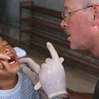 Capt. Roland McCoy, a dentist assigned to Commander,