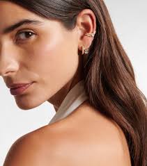 Floating Bezel 18kt gold hoop earrings with diamonds in gold