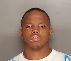 Four charged in shooting death of HHS grad