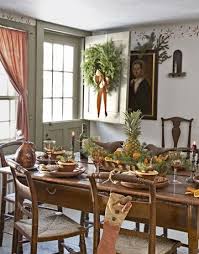The armchairs, in a christopher hyland fabric, and side chairs, in a clarence house velvet, are antiques. A Colonial Christmas Christmas Dining Room Colonial Decor Colonial Dining Room