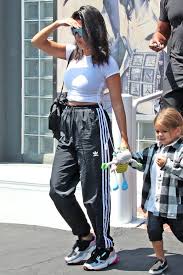 The 100 It Sneakers Celebrities Are Favoring Kardashian Casual Outfit Celebrity Outfits Kardashian Outfit