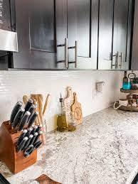 This idea of kitchen backsplash works best with kitchens that have open shelves rather than cabinets. Transform Your Mosaic Tile Backsplash For 30 Come Stay Awhile Modern Farmhouse Style Decor Diy