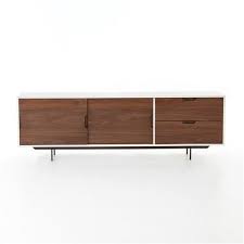 A beautiful way to elevate your entertainment center. Manfred Mid Century White Lacquer Walnut Media Console Long Over 67 W Kathy Kuo Home